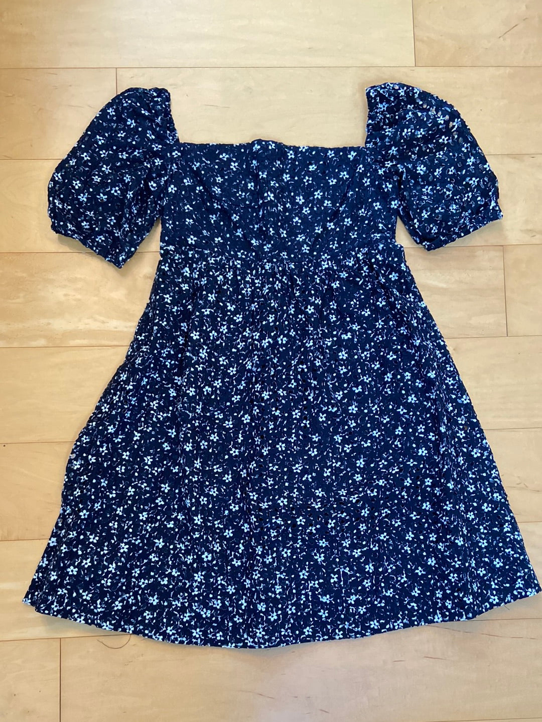 Navy blue with white eyelet dress puff sleeves short sleeve and length knee length skirt fit and flare style
